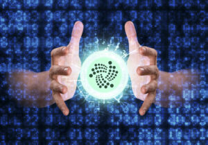 ما هي عمله IOTA؟